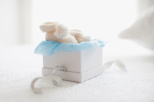 Knit baby booties in gift box