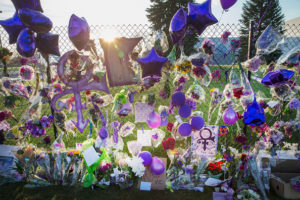 CHANHASSEN, MN - APRIL 23: Mementos left by fans are attached to the fence which surrounds Paisley Park, the home and studio of Prince, on April 23, 2016 in Chanhassen, Minnesota. Prince, 57, was pronounced dead shortly after being found unresponsive April 21 in an elevator at Paisley Park. (Photo by Scott Olson/Getty Images)