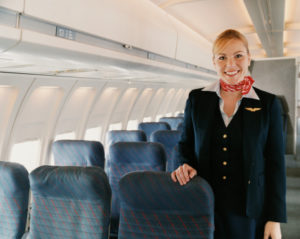 Portrait of a Female Flight Attendant on a Plane