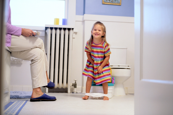 little girl completing potty training