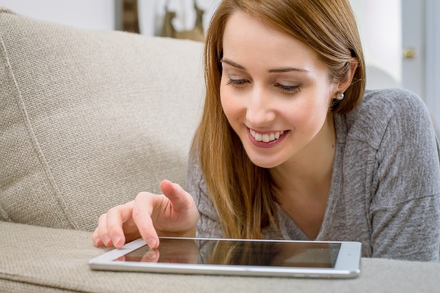 woman using an iPad to stay connected